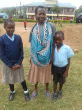 Elizabeth (center) with Cecilia and Emmanuel