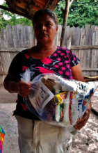 Community Members in Talanga receiving food ration