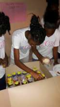 Girls learning team work & patience during baking.