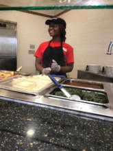 Kim at her dining hall job at Davidson College
