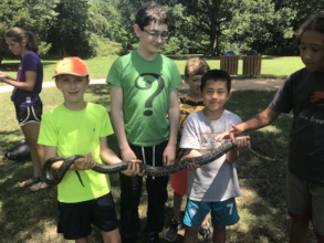 Campers handling Jade, the Rat Snake (2018)