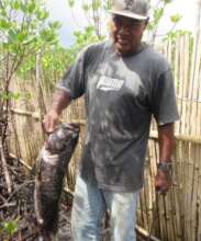A local showing his fish-catch