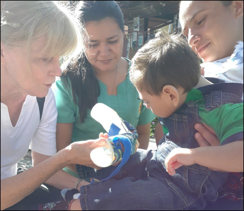 Therapist from the brigad working with child