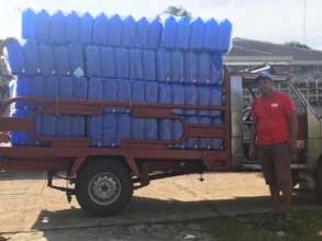 10 gallon water tanks arrive for refugee families