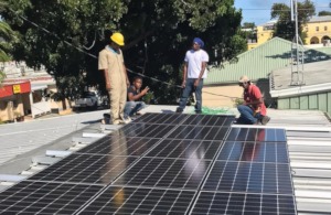 Solar Graduates Install System on Community Center