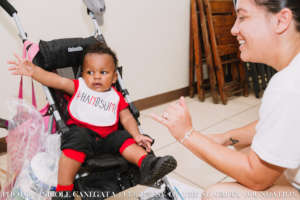 Celebrating supplies with the youngest recipients!