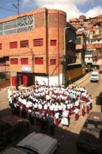 Students praying in front of the School