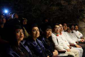 Grads and Fellow Students Watch Translator