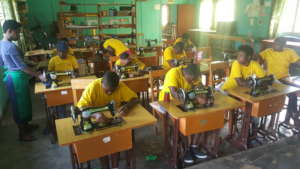 Teen mothers in sewing workshop at Centre Marembo