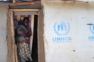 A participant of our program in front of her house