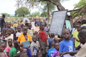 Children at a makeshift school in Palorinya