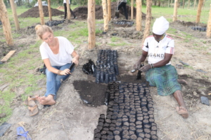 Prepping pots for seedlings in the new nursery