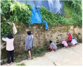 Students taking part in cleaning programme