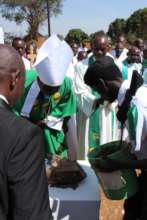 Bishop Bertin laying the school's foundation stone