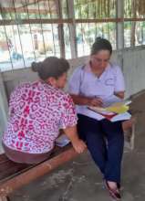 Obstetra Wilda reviewing cancer screening services