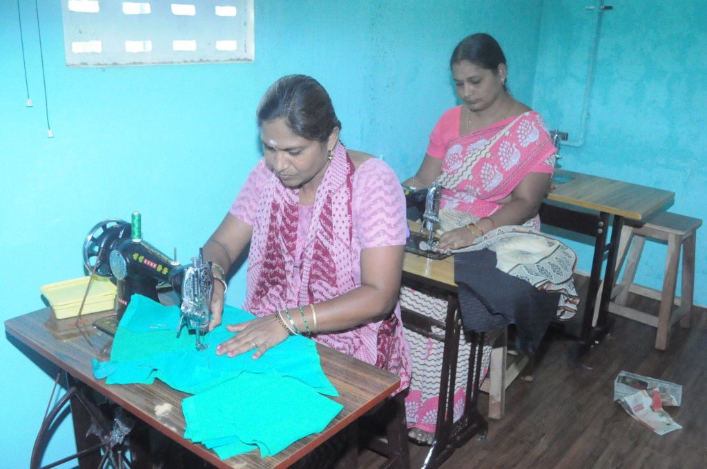 Sewing Machine to a Poor Women to Start Business