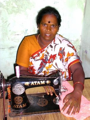 Sewing Machine to a Poor Women to Start Business