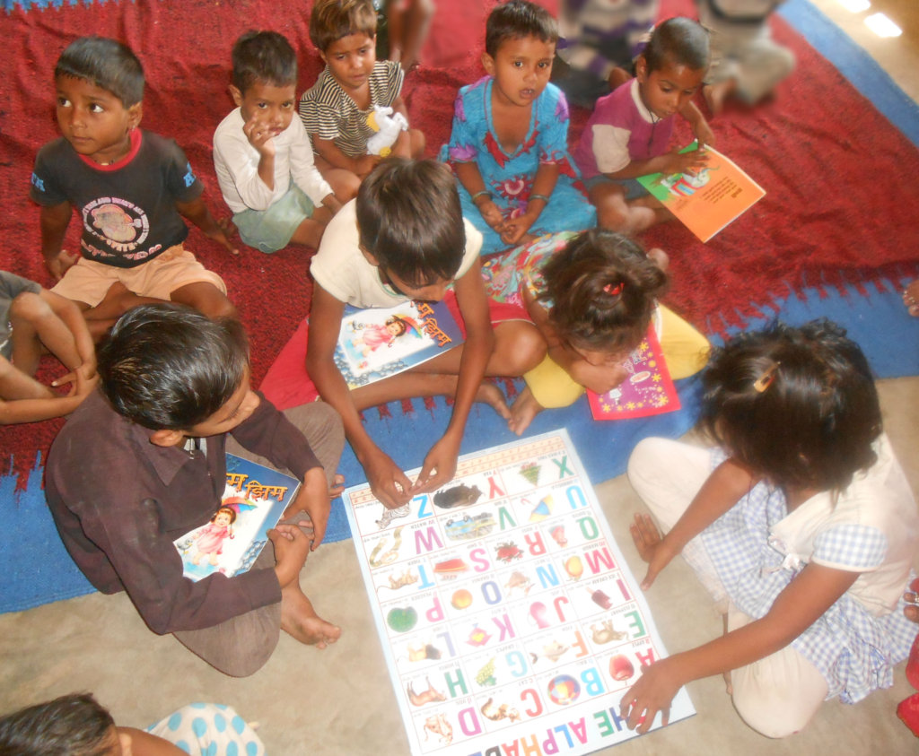 Give Education Materials To 100 School Child