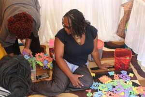 Childline therapists setting up the therapy space