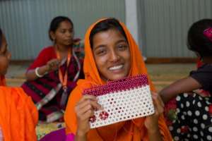 Kohinur, 14, who is learning Burmese and English