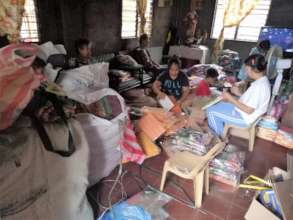 Packing gifts and supplies for Capiz flood victims