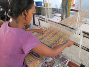 Artisan weaving on new SEPALI loom