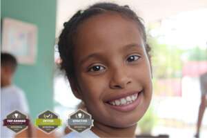 Smiling Little Girl Receiving Medical Care