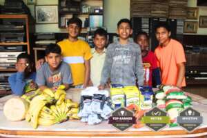 Orphans Receiving Food and Supplies from SAI