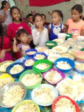 Orphans receiving food