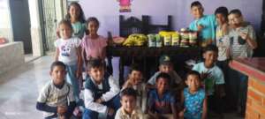 Happy children receiving love and food