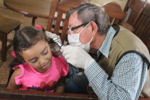 SAI Medical Assistant Examines An Orphan Girl.
