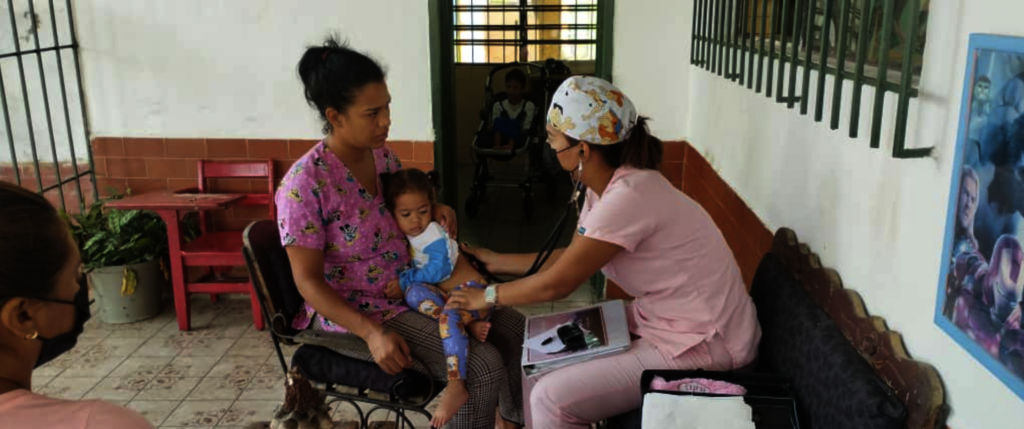 SAI Ensures Orphaned Children in Venezuela Receive Essential Healthcare SAI (South American Initiative), a non-profit organization devoted to helping orphaned children, provides vital medical care to ensure their health and well-being. In this image, a caring healthcare professional gently examines a small child, reinforcing SAI’s commitment to offering free check-ups, medicine, and essential treatments. With the ongoing support of donors and volunteers, SAI continues to safeguard vulnerable children, giving them access to healthcare that helps them grow strong and thrive.