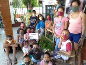 All have personal protective masks for Covid-19.