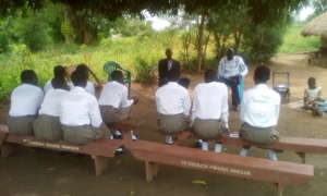 The team of KIFA listen to one of the victim
