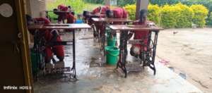 Girls servicing & maintaining sewing machines