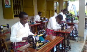 Across section of 10 girls making facemasks