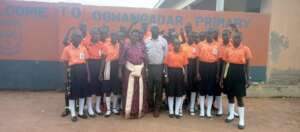 In the photo: Pupils, Headteacher & KIFA team