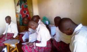 Girls attending lesson on scouting