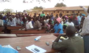 Angic:  Community giving their plan to GOD