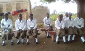 Girls of KIFA listen to the victim