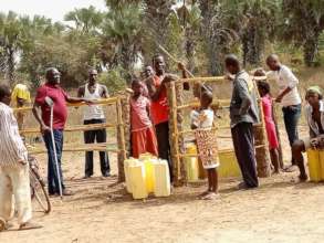 Project Leader on Red T-shirt supervises the work