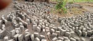 A number of bricks being laid by the youth