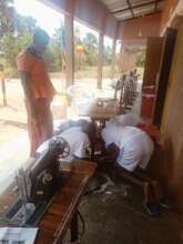 Procured sewing machines being assembled at office
