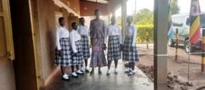 Empowerment: middle girl made a cloth for herself