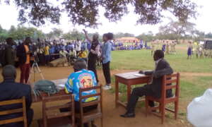 GlobalGiving Representative talks to community