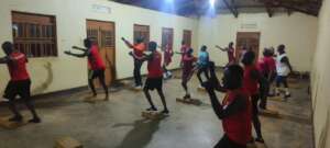 Students: with others participate in an aerobic