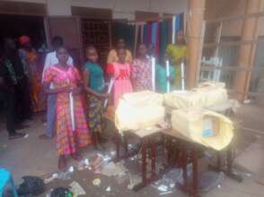 Girls displaying their Procured Machines