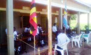 Visiting Director encouraging the girls