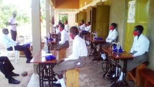 World Vision Staff talks to the girls