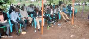 Agroup of male youth: Discussing educational issue